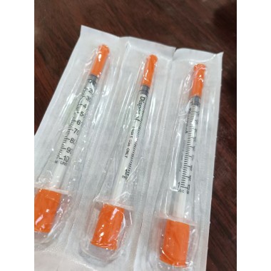 Disposable insulin syringe
