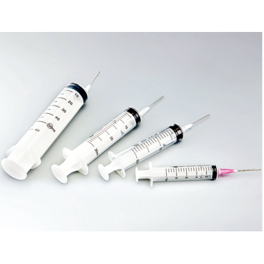 Disposable dispensing syringe