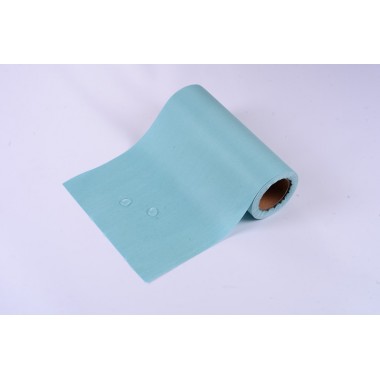 Water resistant spunlace woodpulp nonwoven fabric