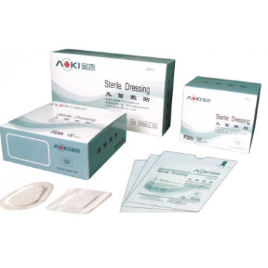 Adhesive non-woven wound dressing